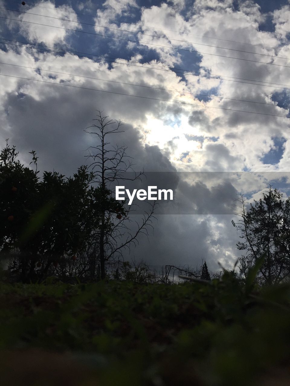 STORM CLOUDS OVER LANDSCAPE