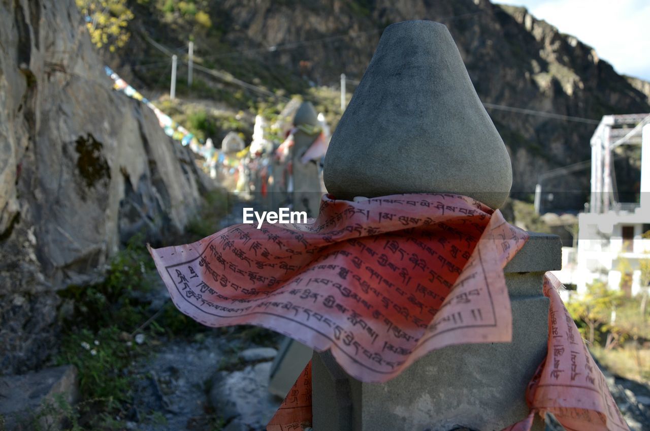 Close-up of altar tied with fabric at mountains