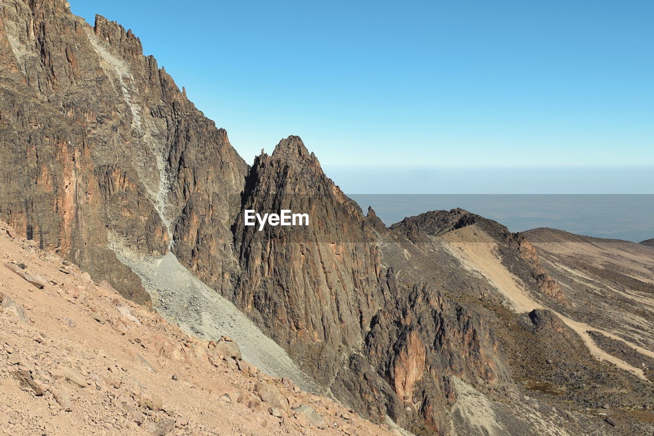 Rock formations above the clouds at mount kenya