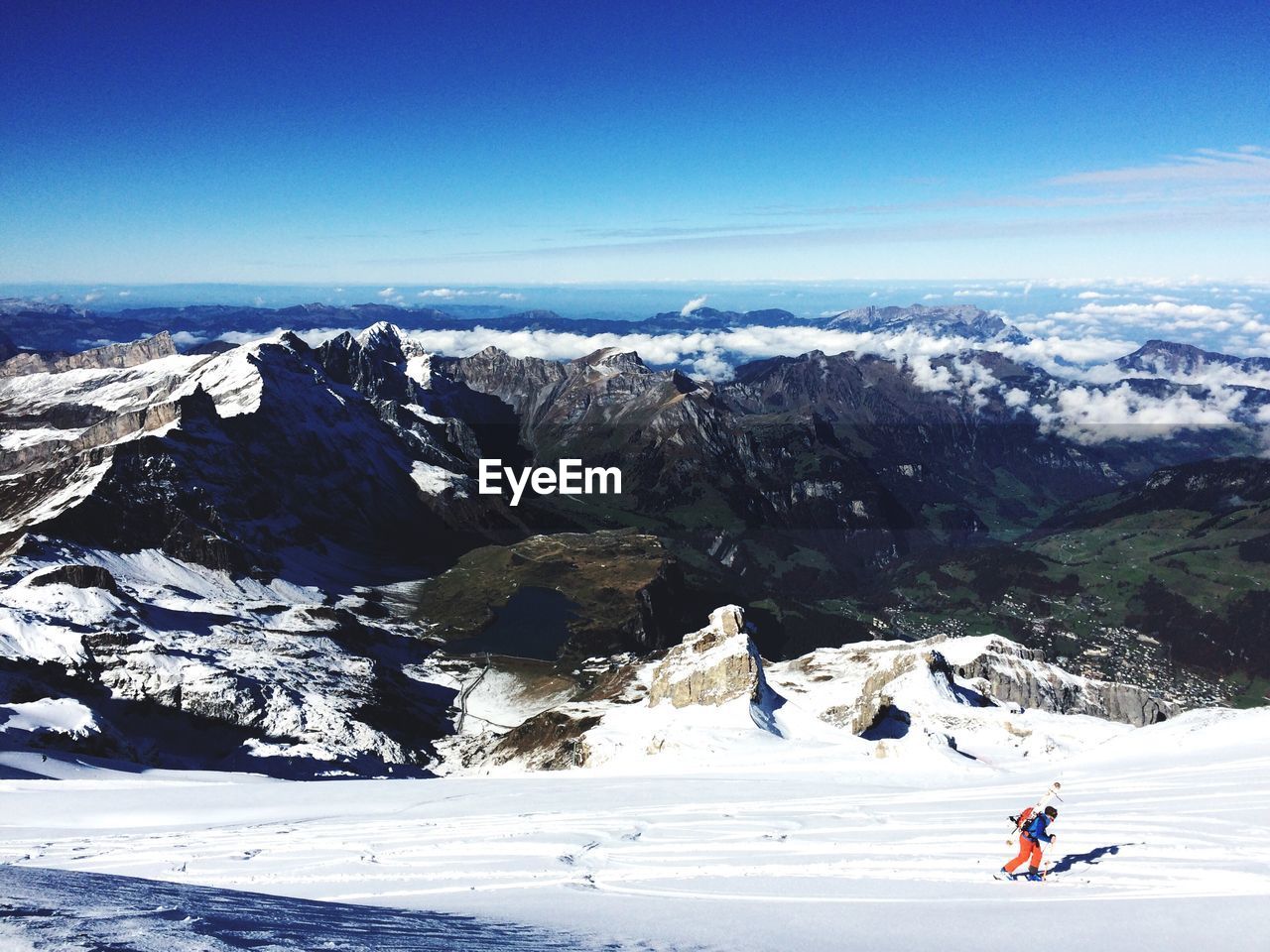 Woman skiing against sky