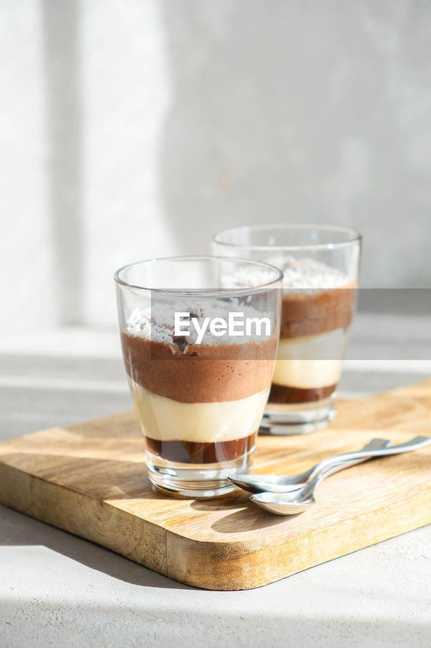 Unusually delicious three-layer chocolate-vanilla and creme brulee mousse dessert