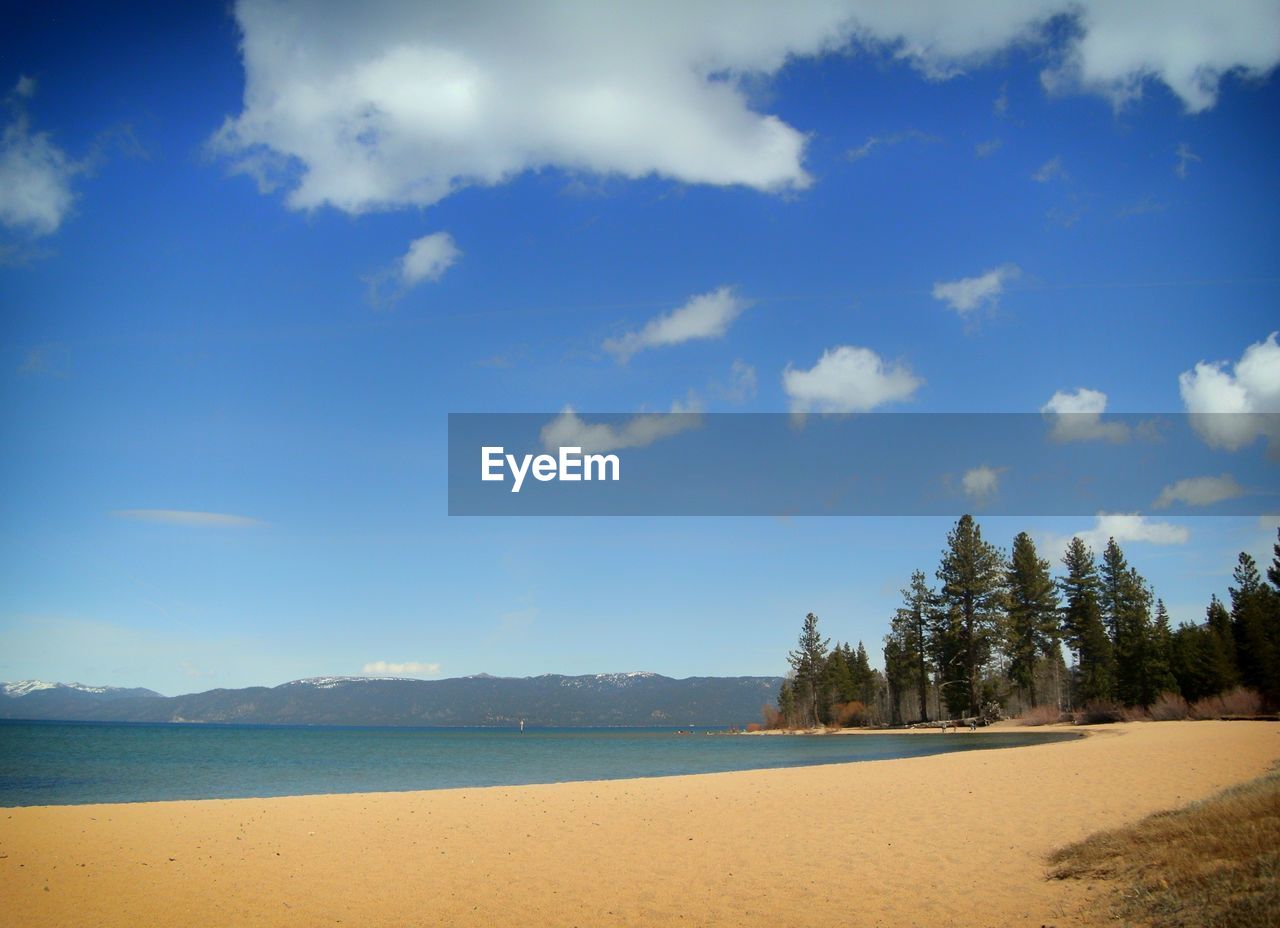 Scenic view of lake tahoe against sky