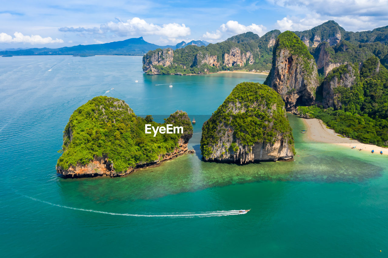 Panoramic view of bay against sky