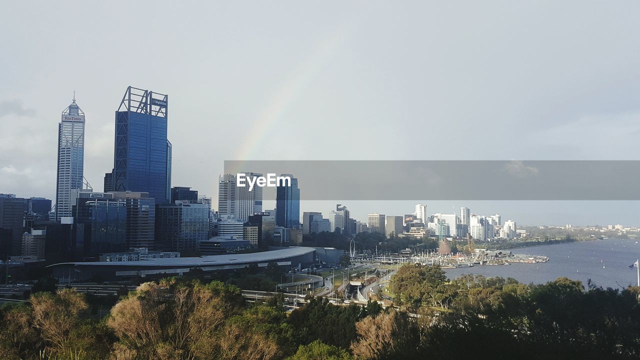 Buildings in city against sky