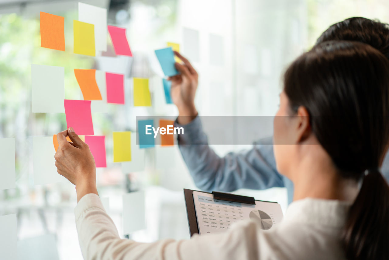 Business colleagues brainstorming in office