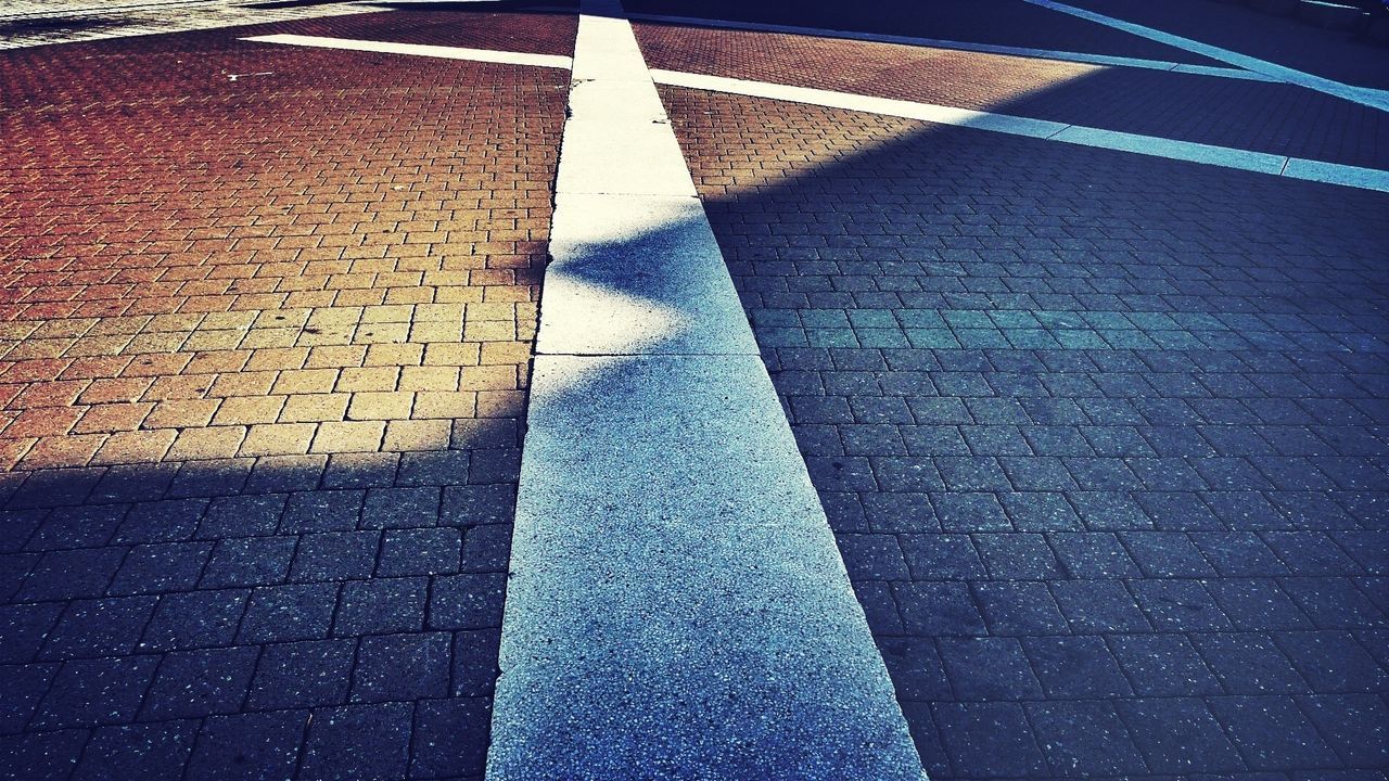 High angle view of geometric shape on sidewalk