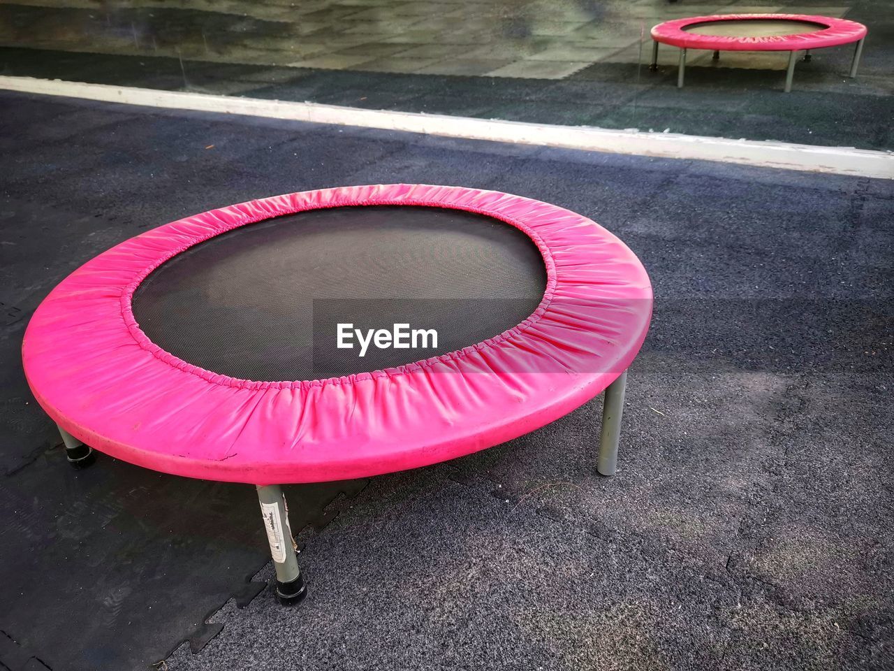 HIGH ANGLE VIEW OF EMPTY CHAIRS AND TABLE AT SIDEWALK