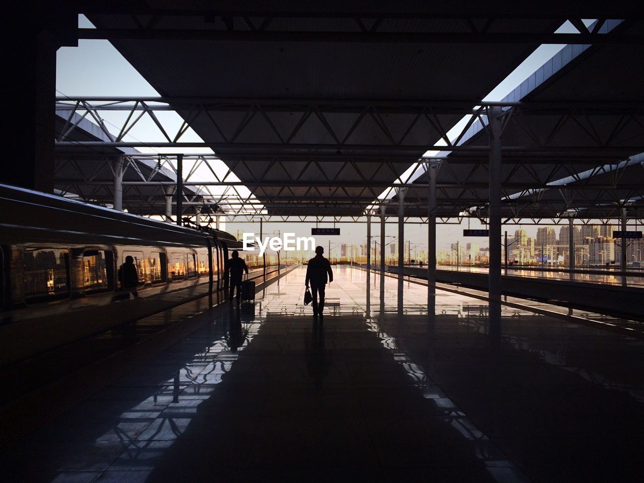 People at railroad station