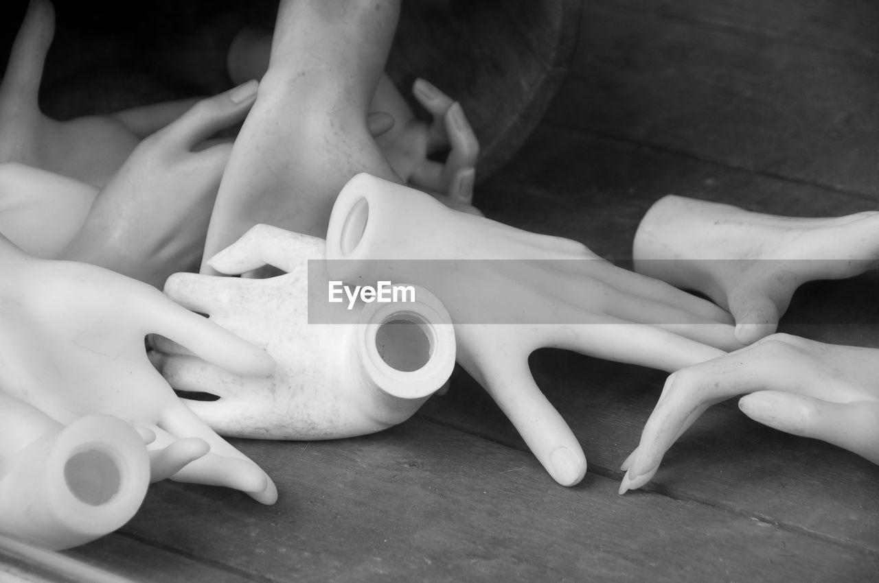 High angle view of artificial hands on table