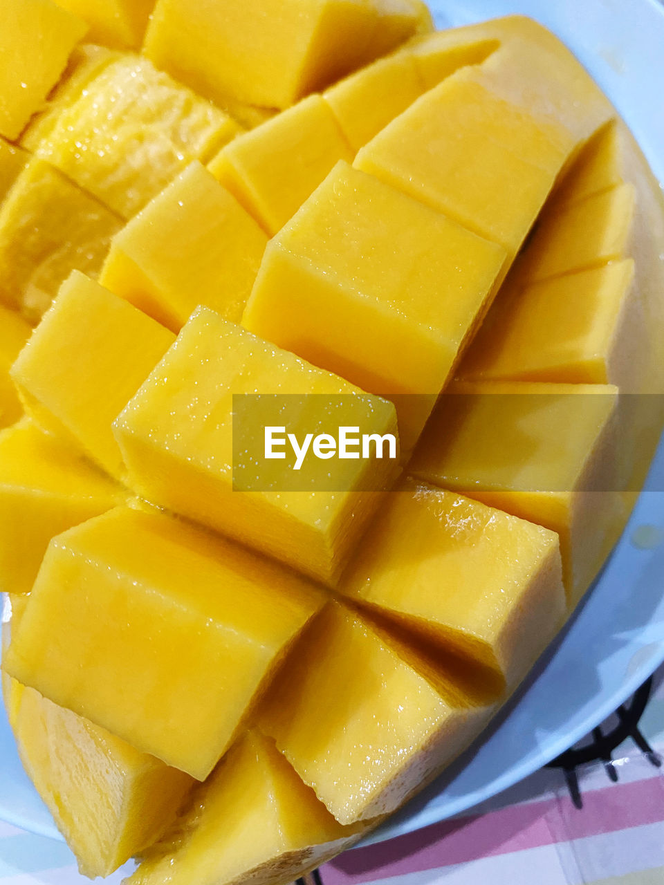 CLOSE-UP OF YELLOW CAKE WITH SLICE