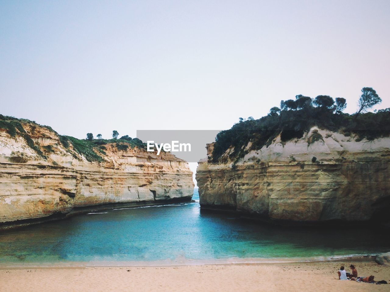 SCENIC VIEW OF ROCK FORMATION IN SEA