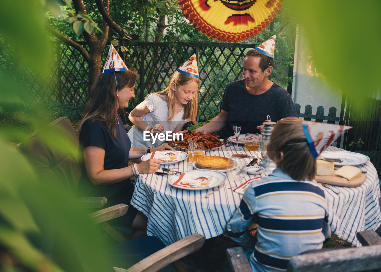 Family having garden dinner