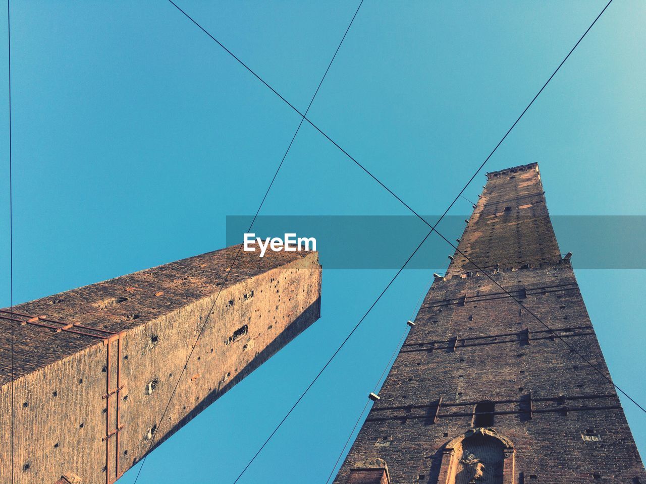 LOW ANGLE VIEW OF CABLES AGAINST SKY