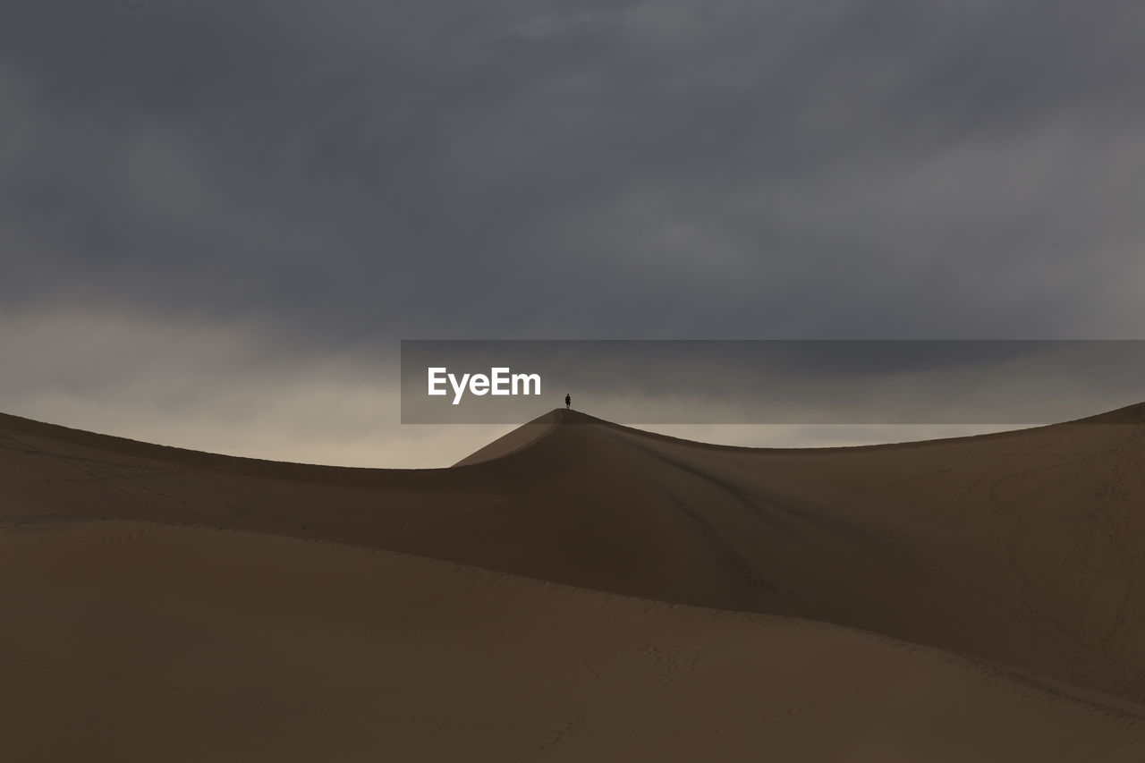 Scenic view of desert against sky