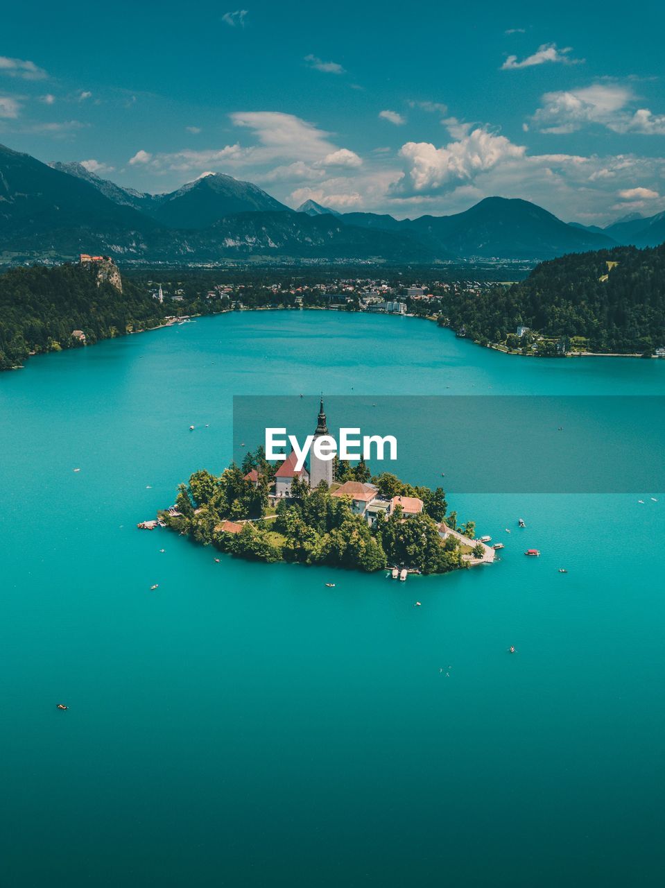 SCENIC VIEW OF ISLAND IN SEA AGAINST SKY