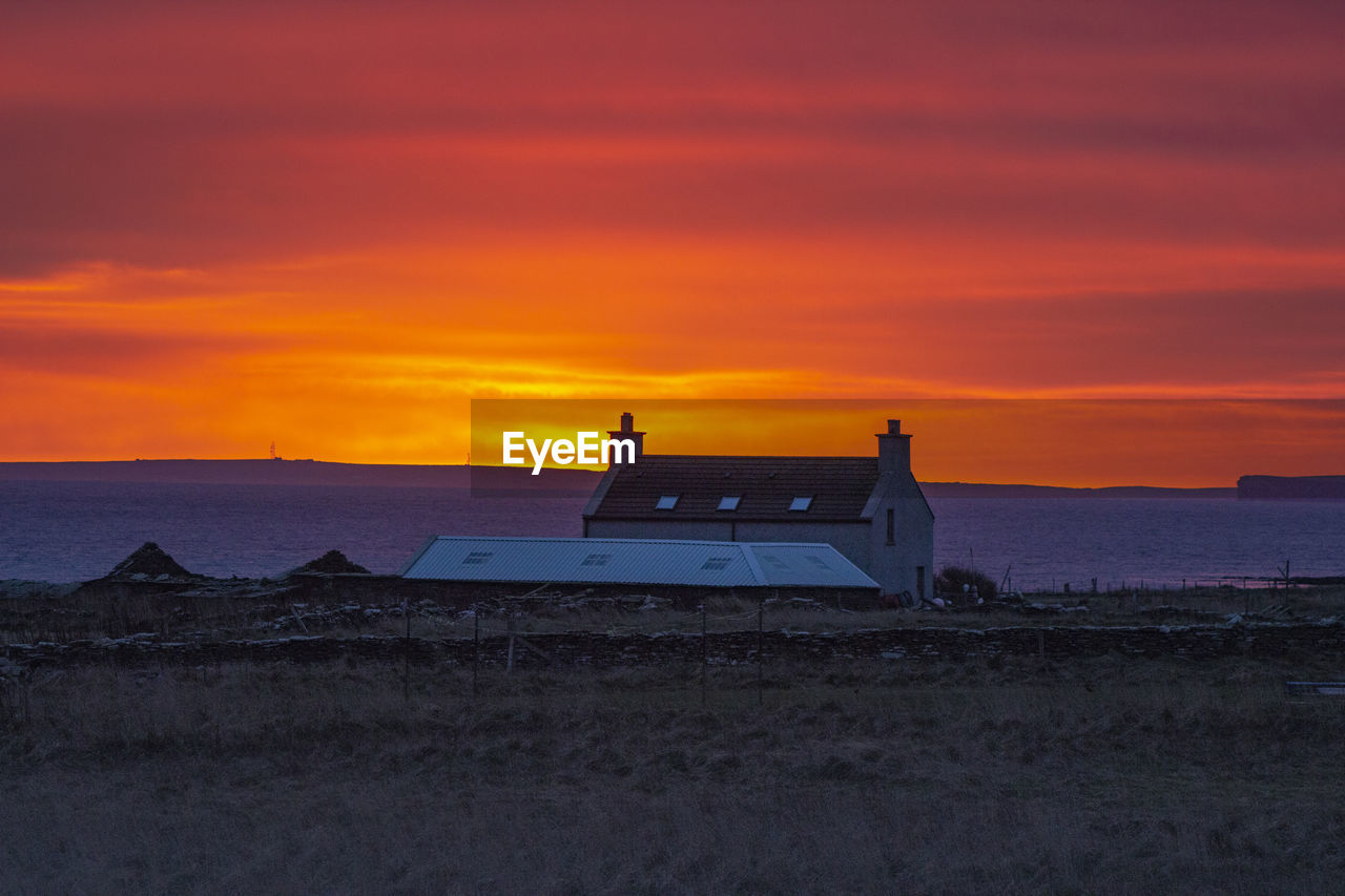 SCENIC VIEW OF SEA DURING SUNSET