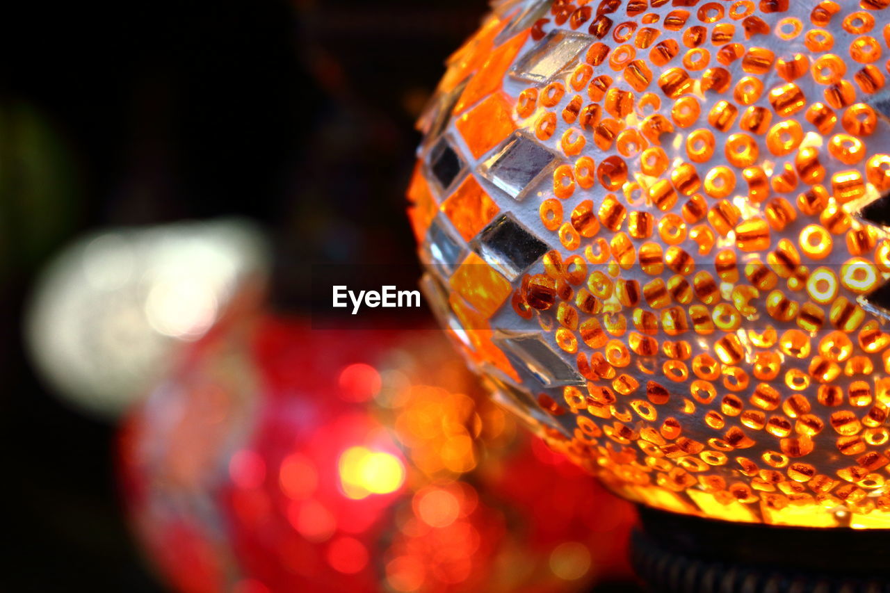 Close-up of round decorations against blurred background