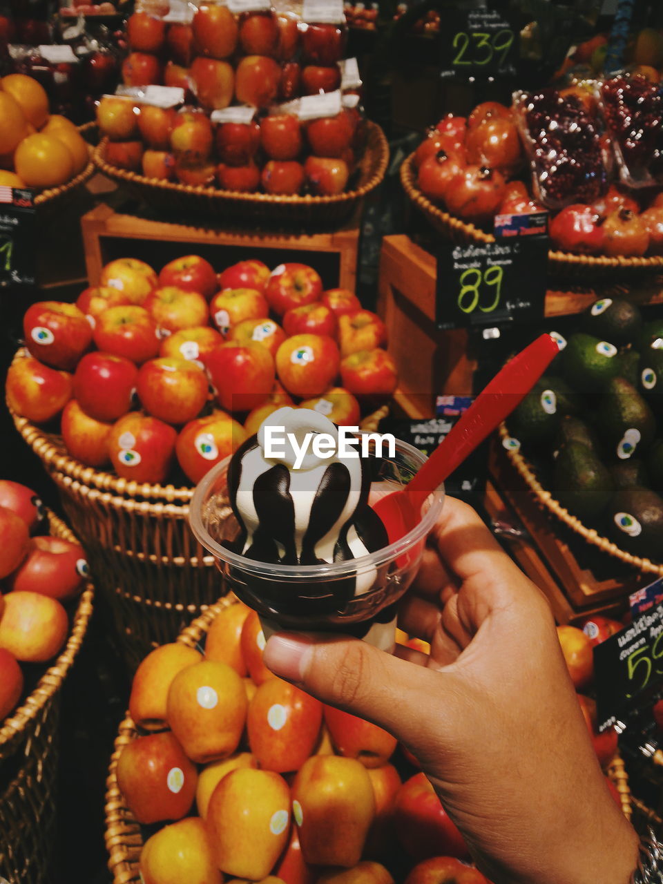 High angle view of fruits and ice cream  in basket at store