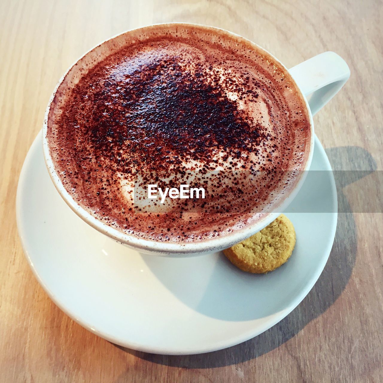 High angle view of cappuccino on table