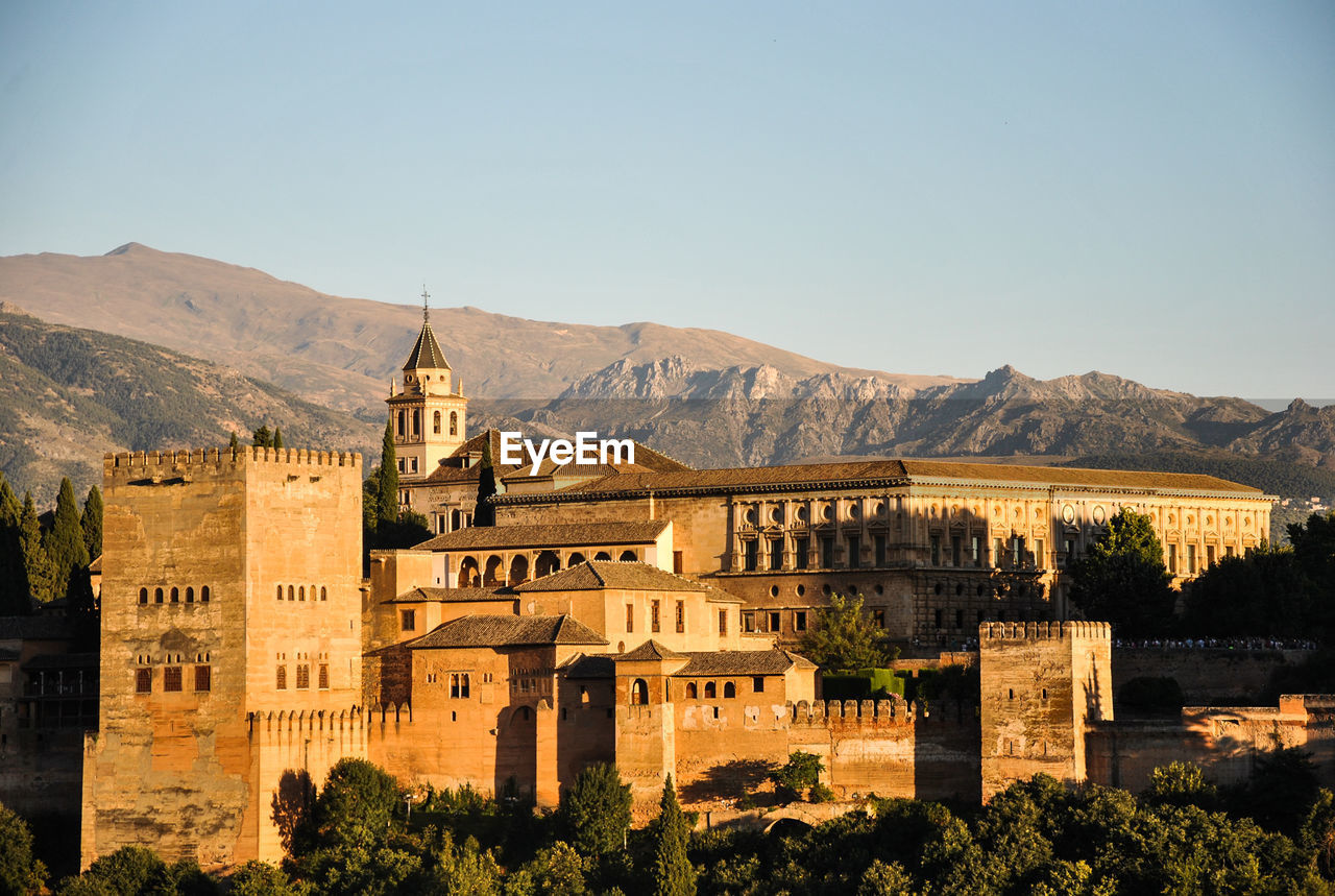 Old building against mountain range