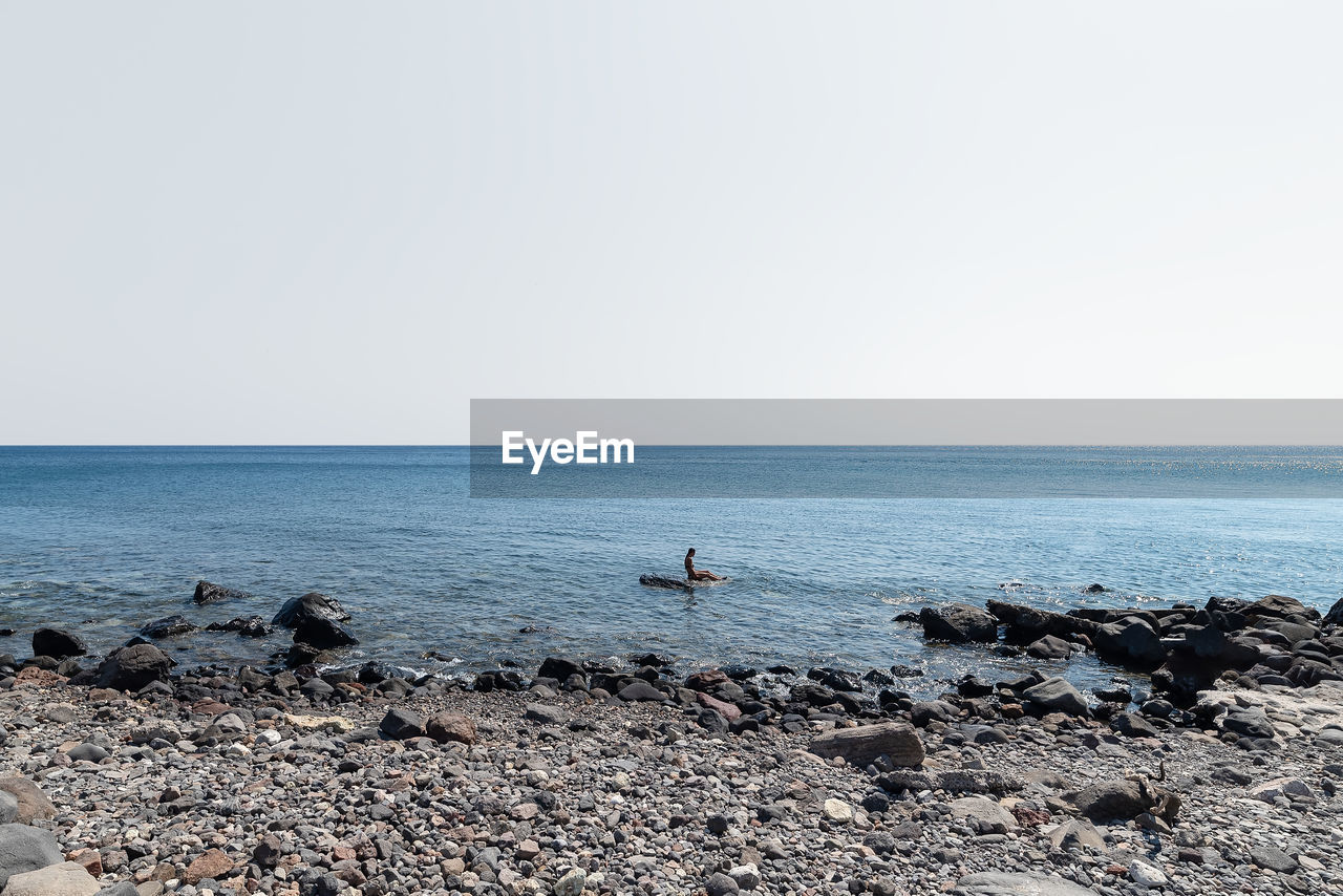 VIEW OF SEA AGAINST CLEAR SKY