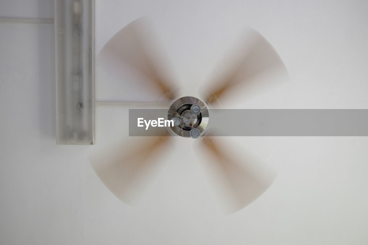 Low angle view of ceiling fan at home