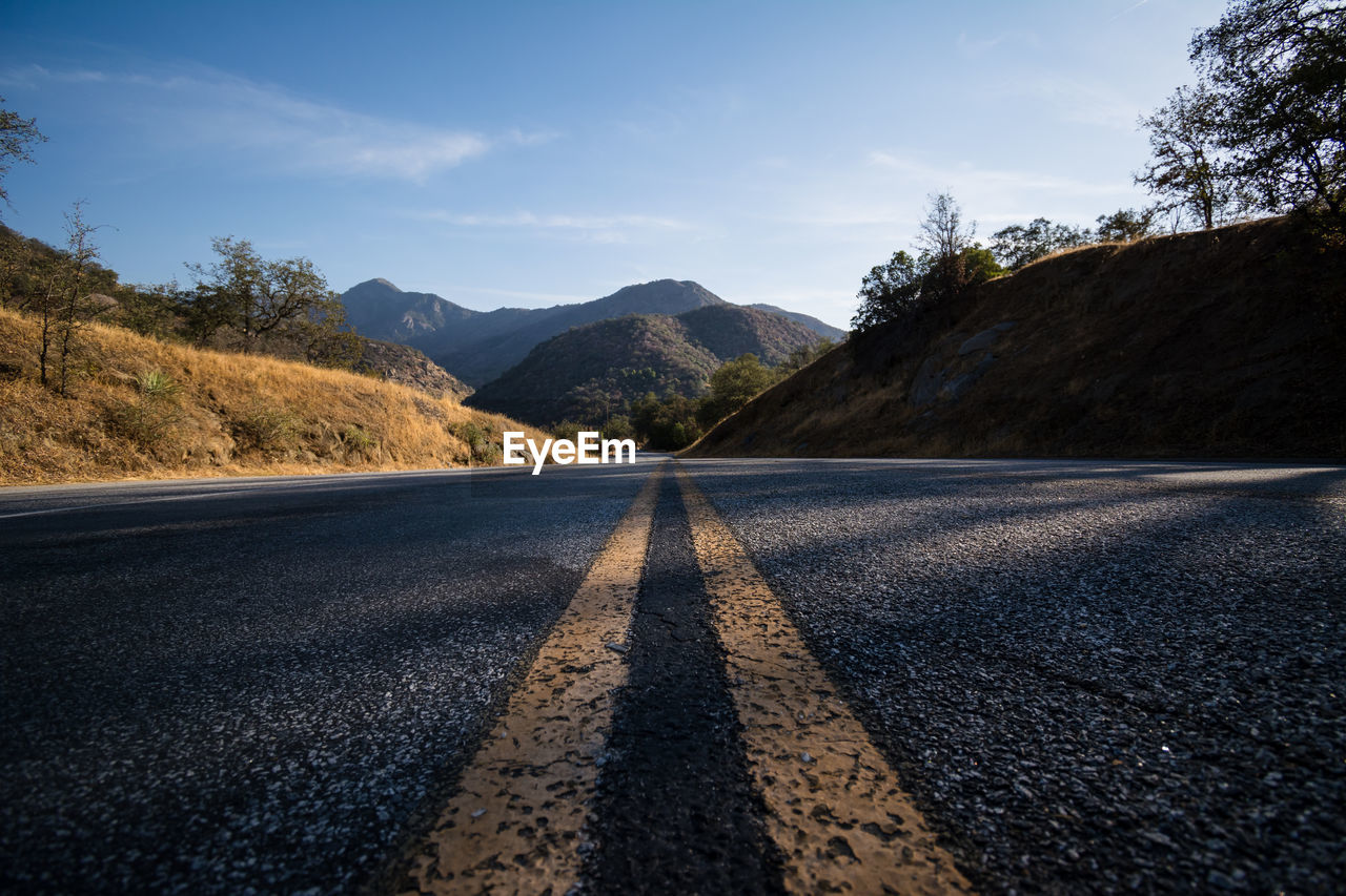 Surface level of road against mountain range