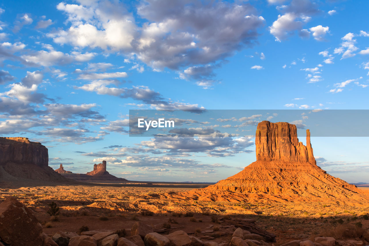 Panoramic view of rock formations in monument valley against sky