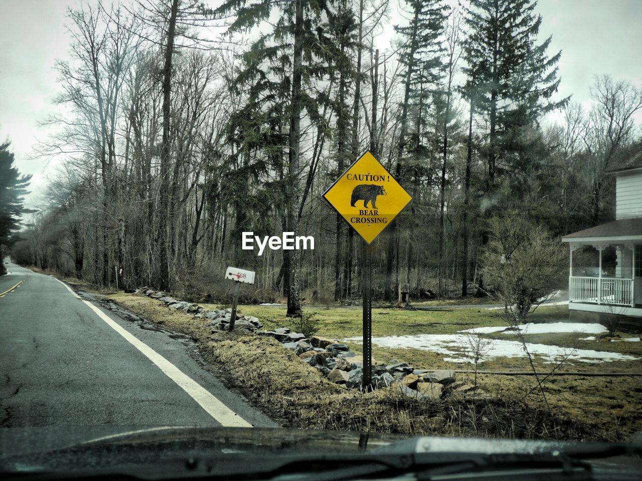 Road sign seen through windshield