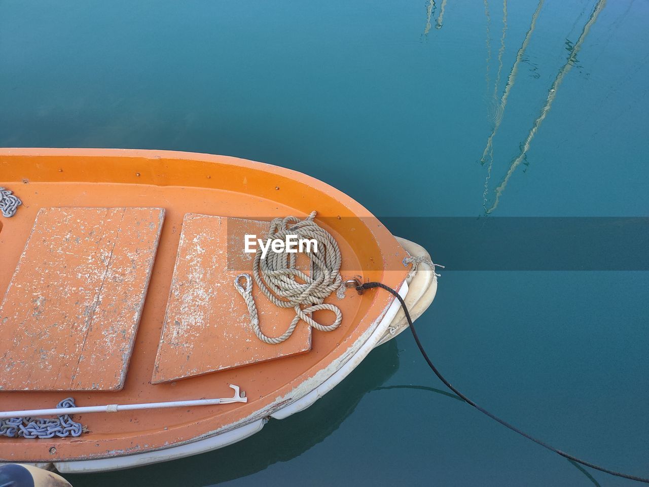 High angle view of boat moored in lake