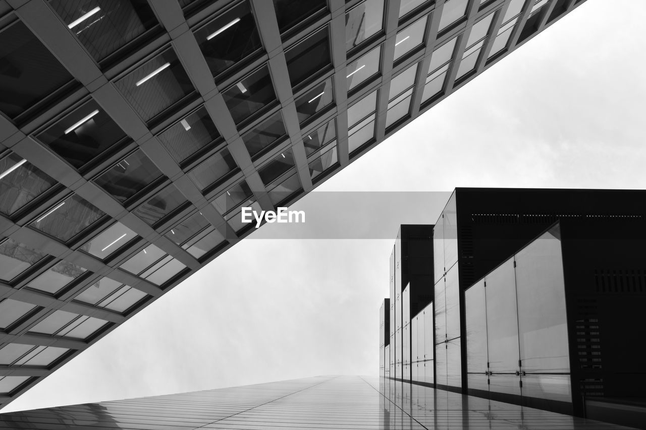 Low angle view of modern buildings against sky