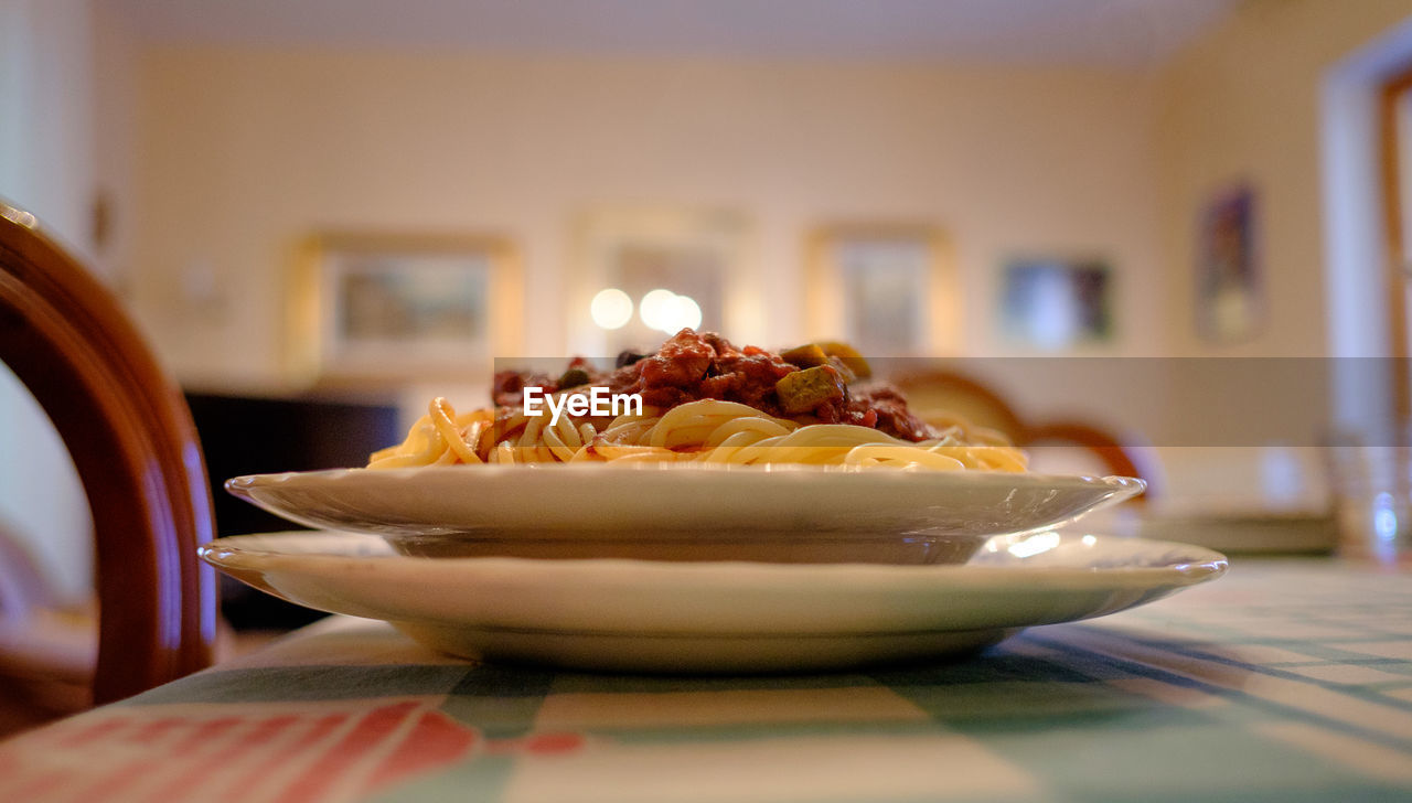 Close-up of pasta in plate on table