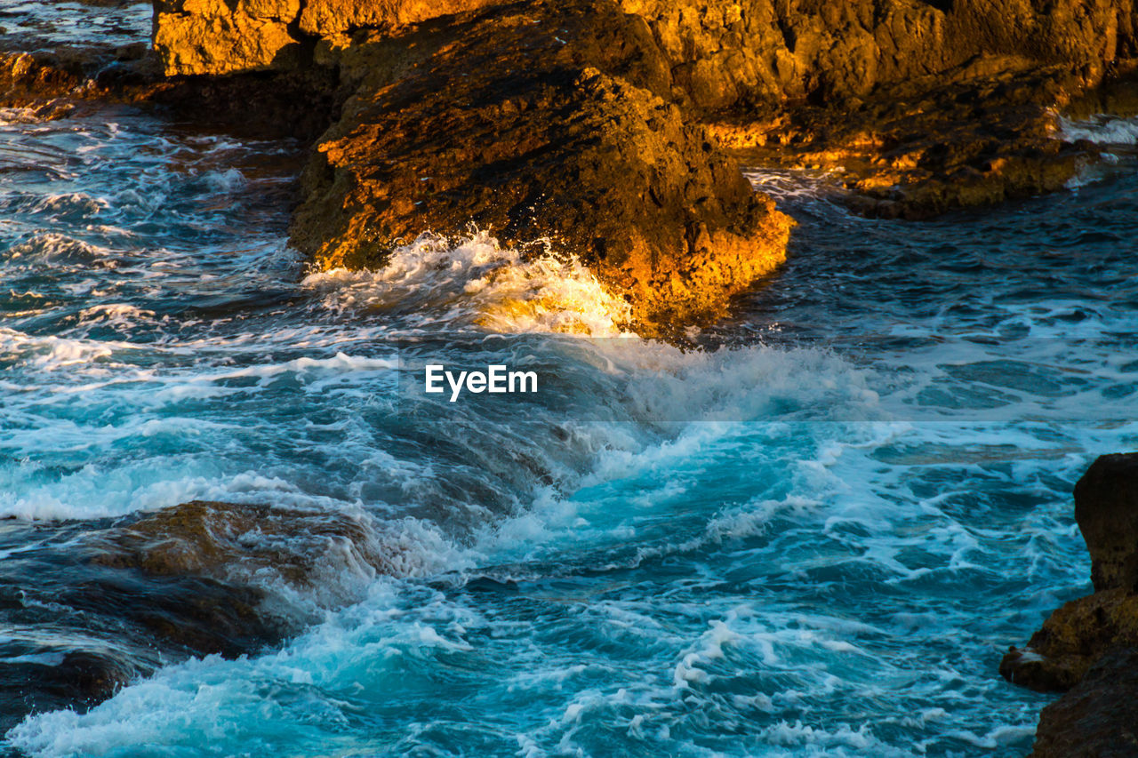 Scenic view of rocks in sea