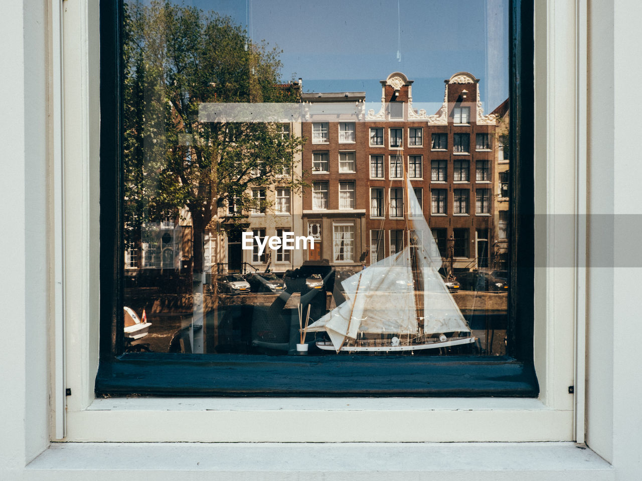 City buildings seen through window