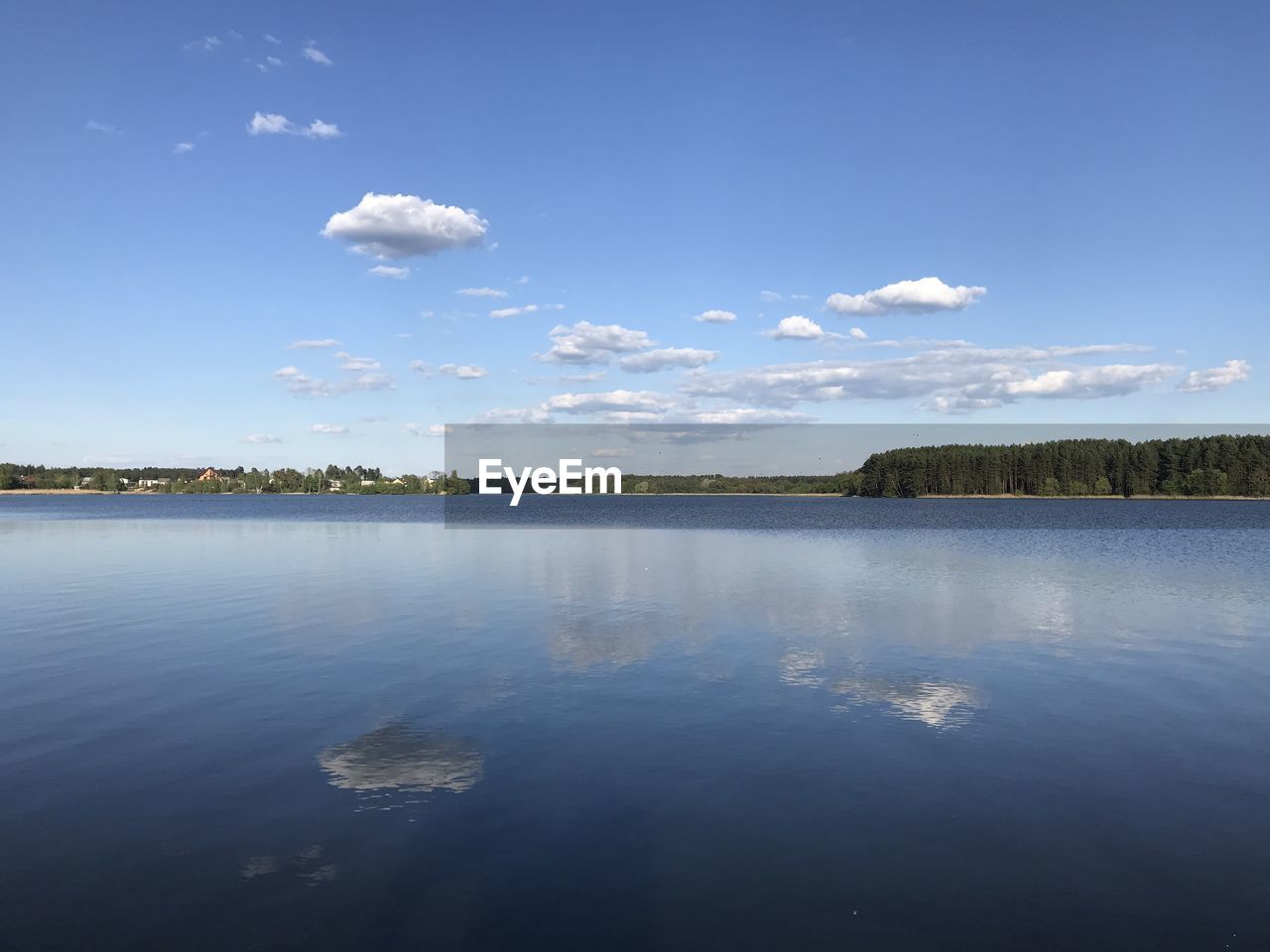 Scenic view of river and sky reflection