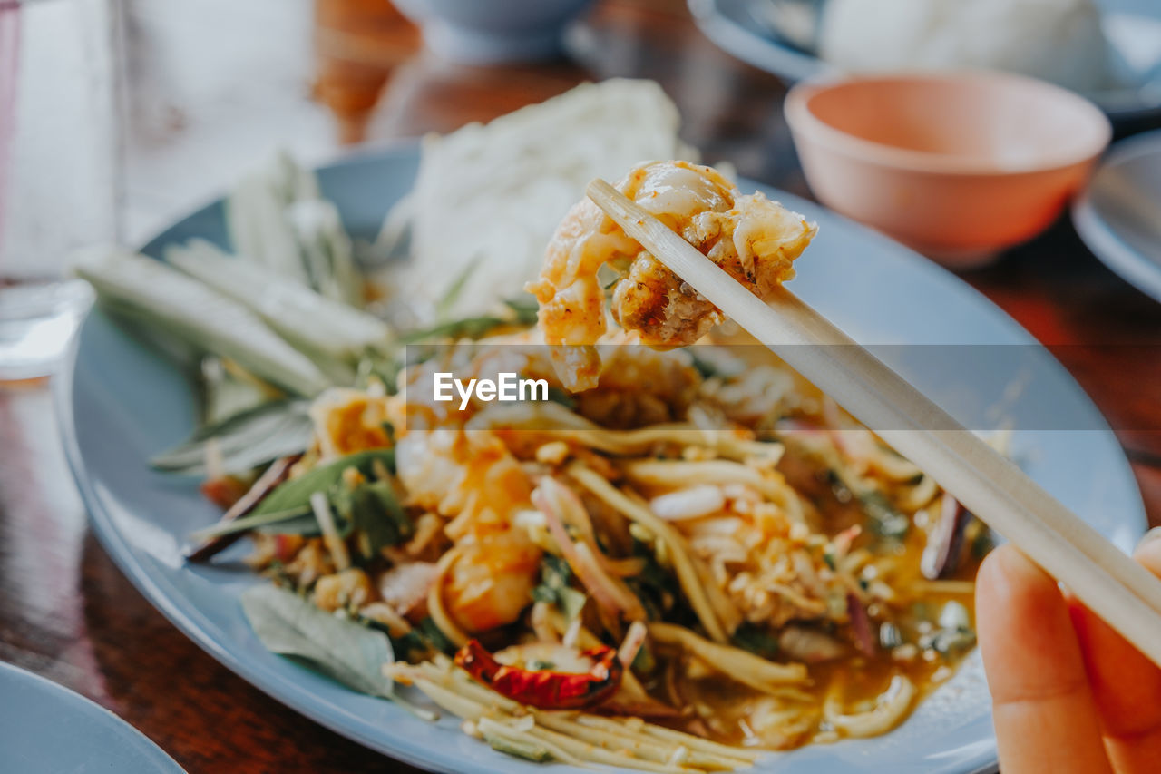 Close-up of thai food served on table