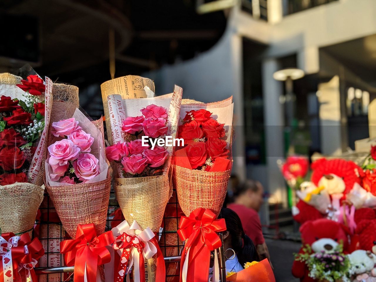 Close-up of red flowers for sale at market stall