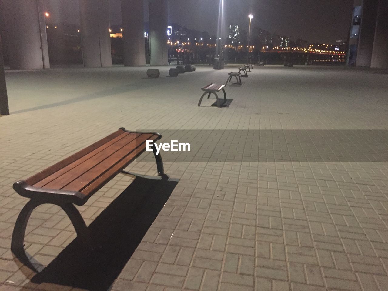 EMPTY BENCHES AT NIGHT