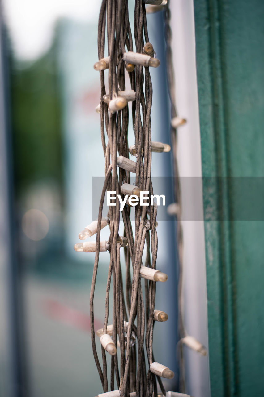 Close-up of string lights hanging outdoors