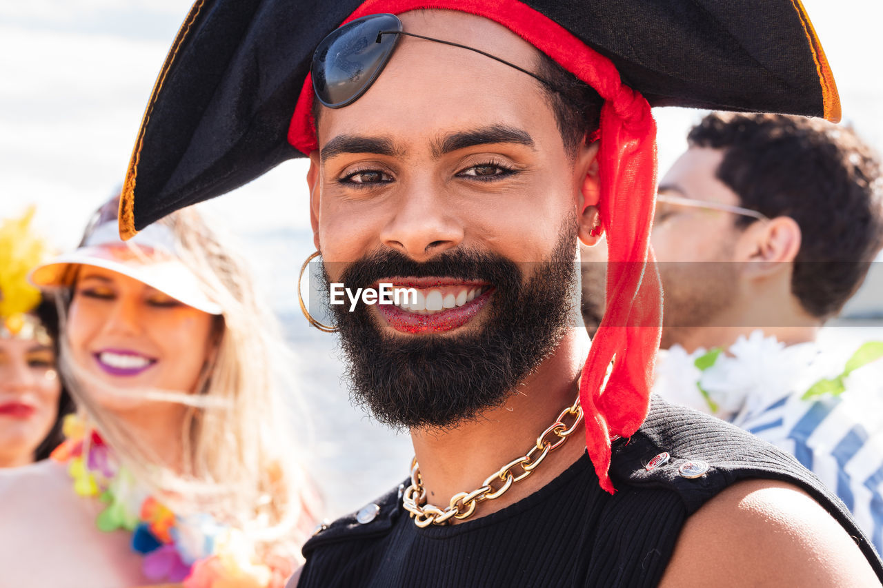 Portrait of smiling man wearing costume