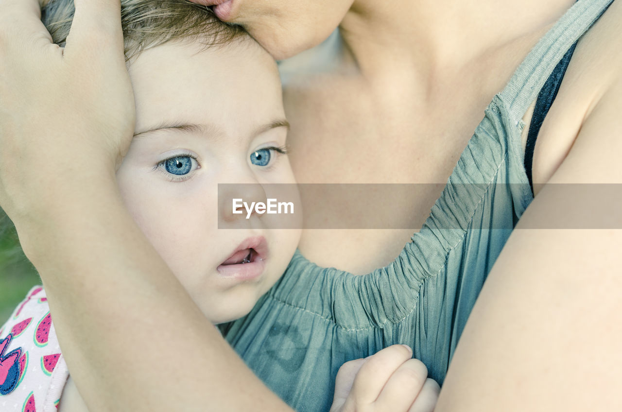 Close-up of mother with baby