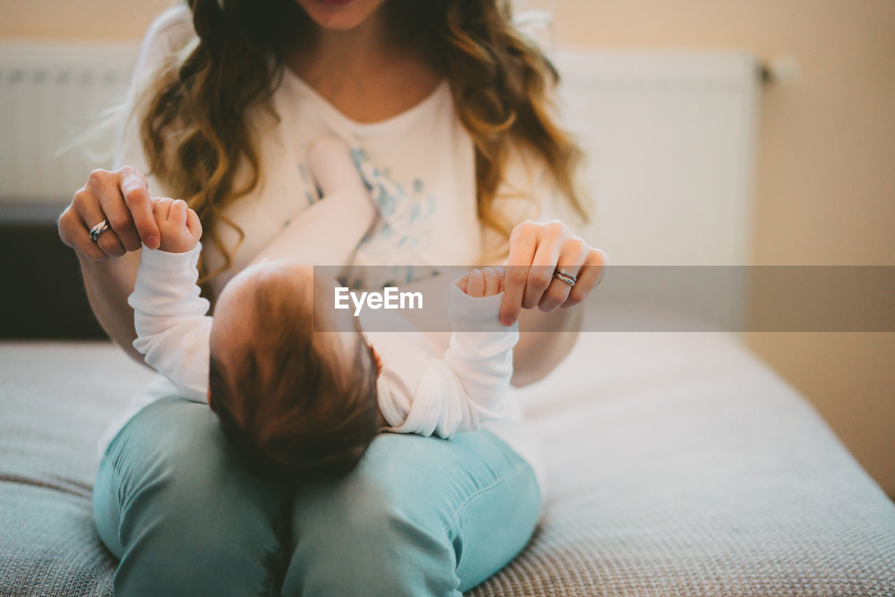 Close-up of woman with baby