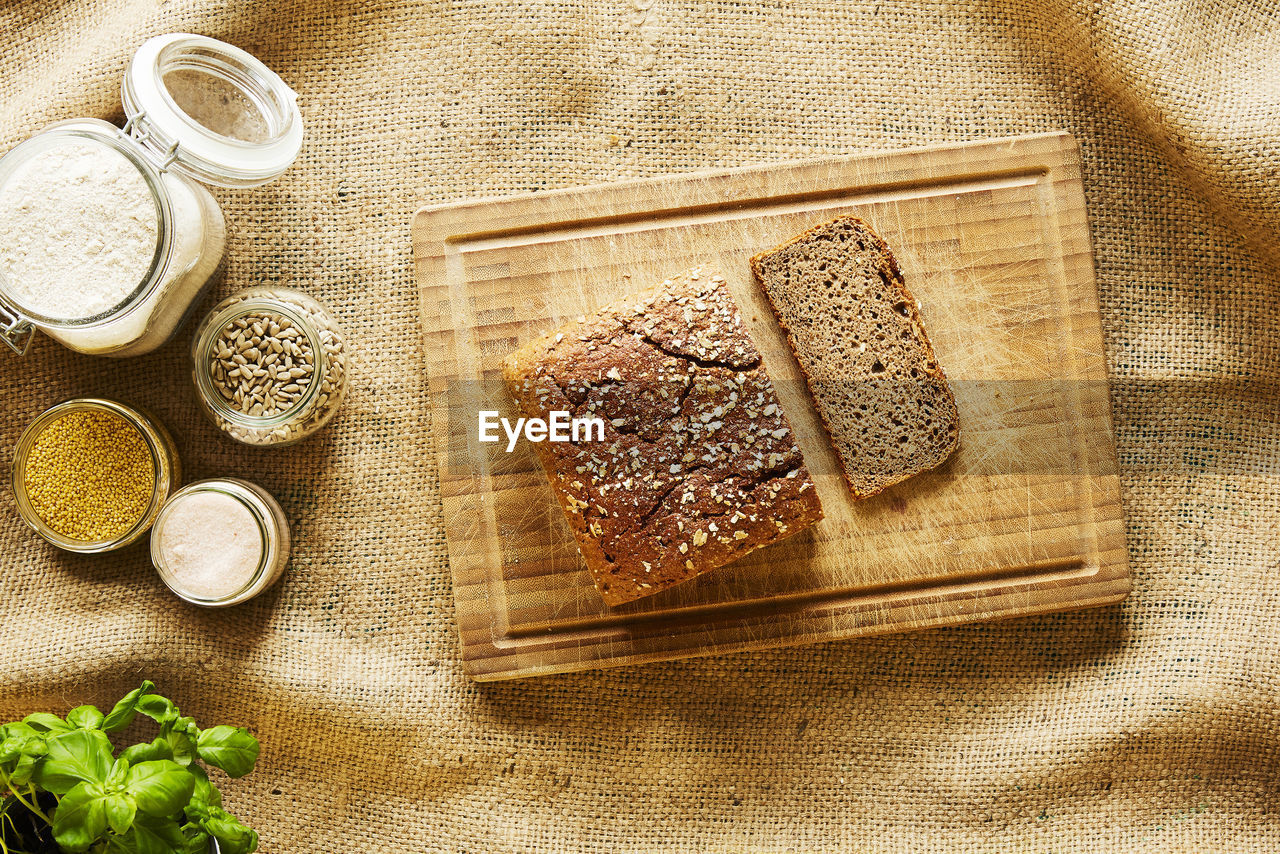 HIGH ANGLE VIEW OF BREAKFAST ON CUTTING BOARD