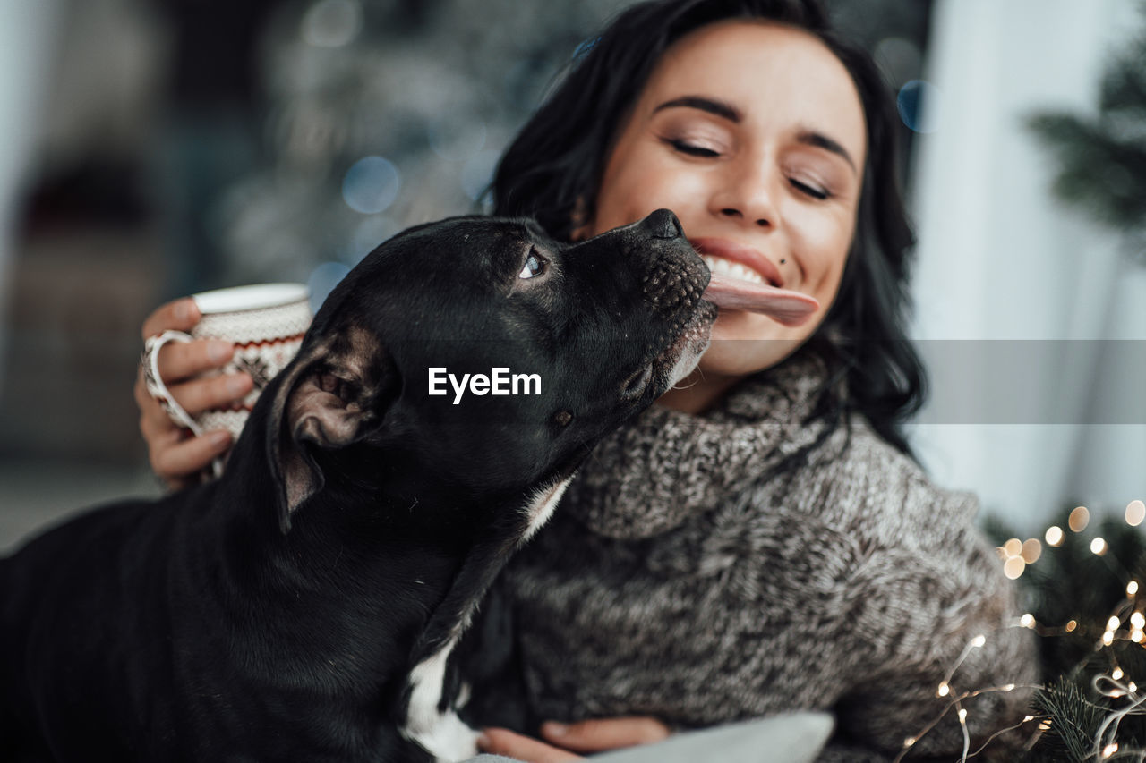 Portrait of woman with dog