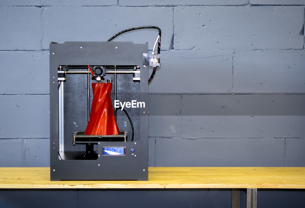3d printer working close up. automatic three dimensional 3d printer performs plastic. 