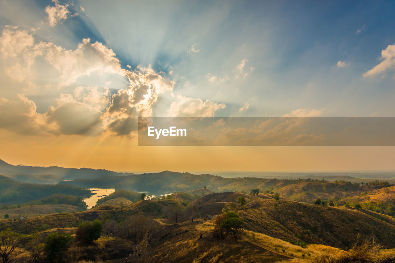 Scenic view of landscape against sky during sunset