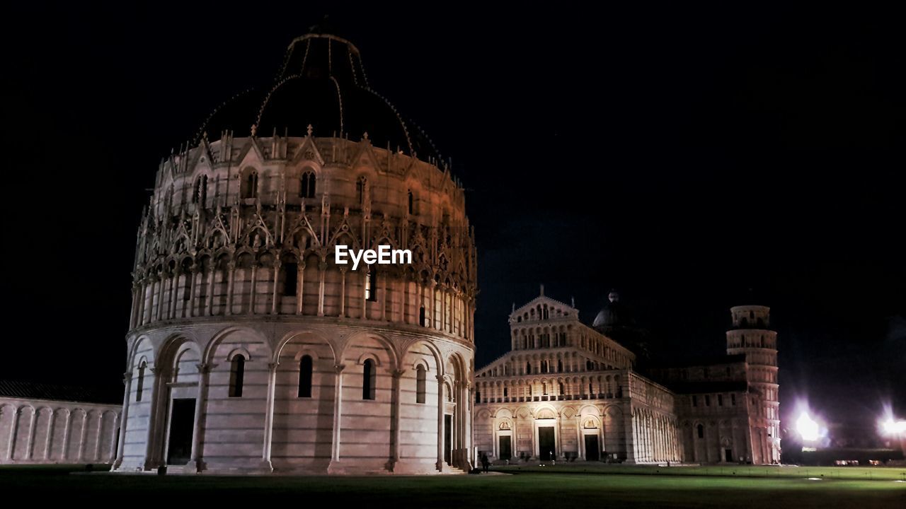 LOW ANGLE VIEW OF CHURCH AT NIGHT