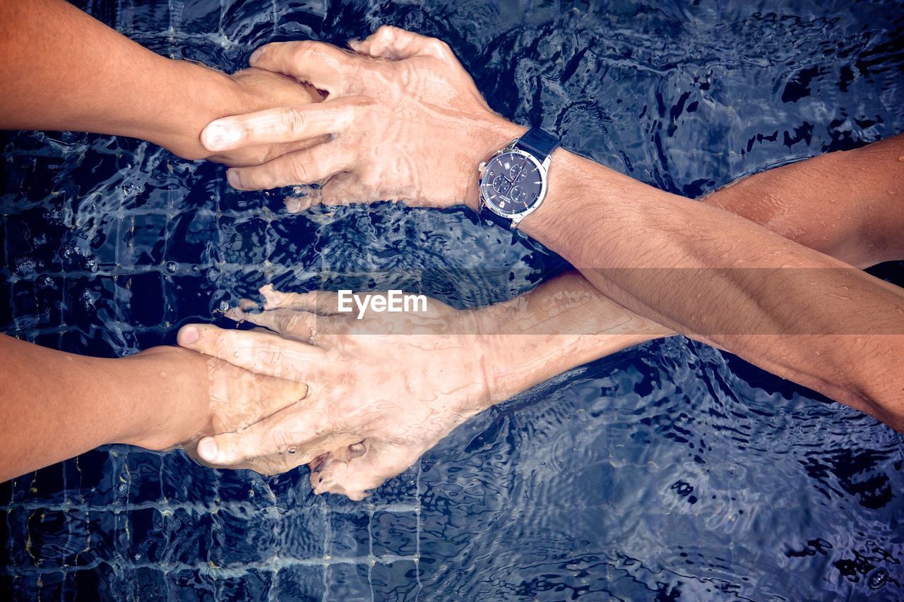 Close-up of people in swimming pool