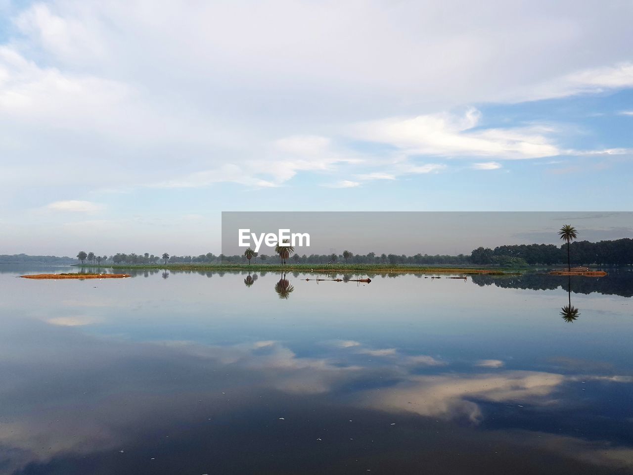 REFLECTION OF CLOUDS IN LAKE