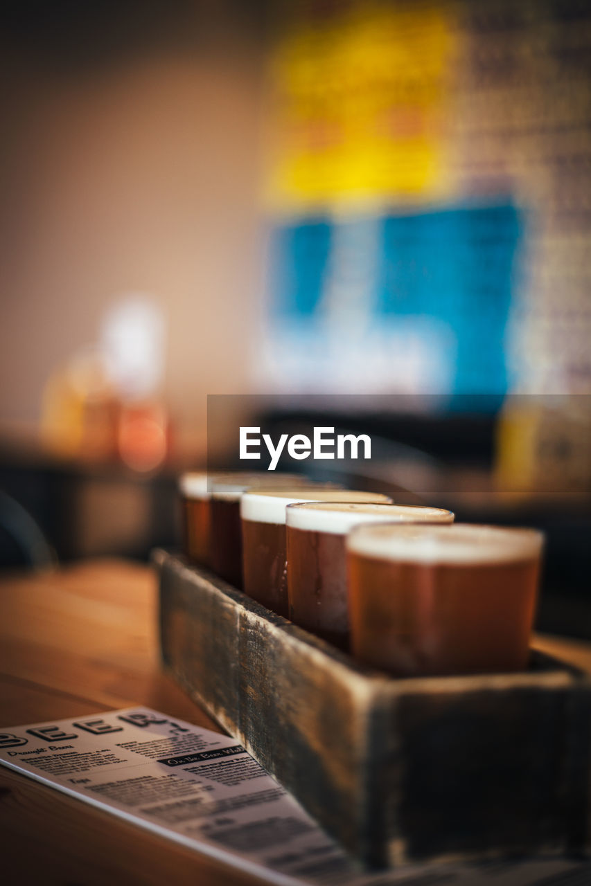 Close-up of beer flight on table